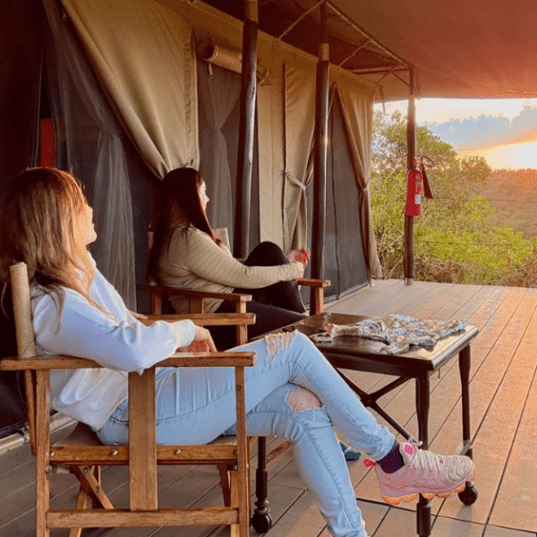 Couple enjoying sundowners on a luxury safari in Africa with Daylight Adventures-min